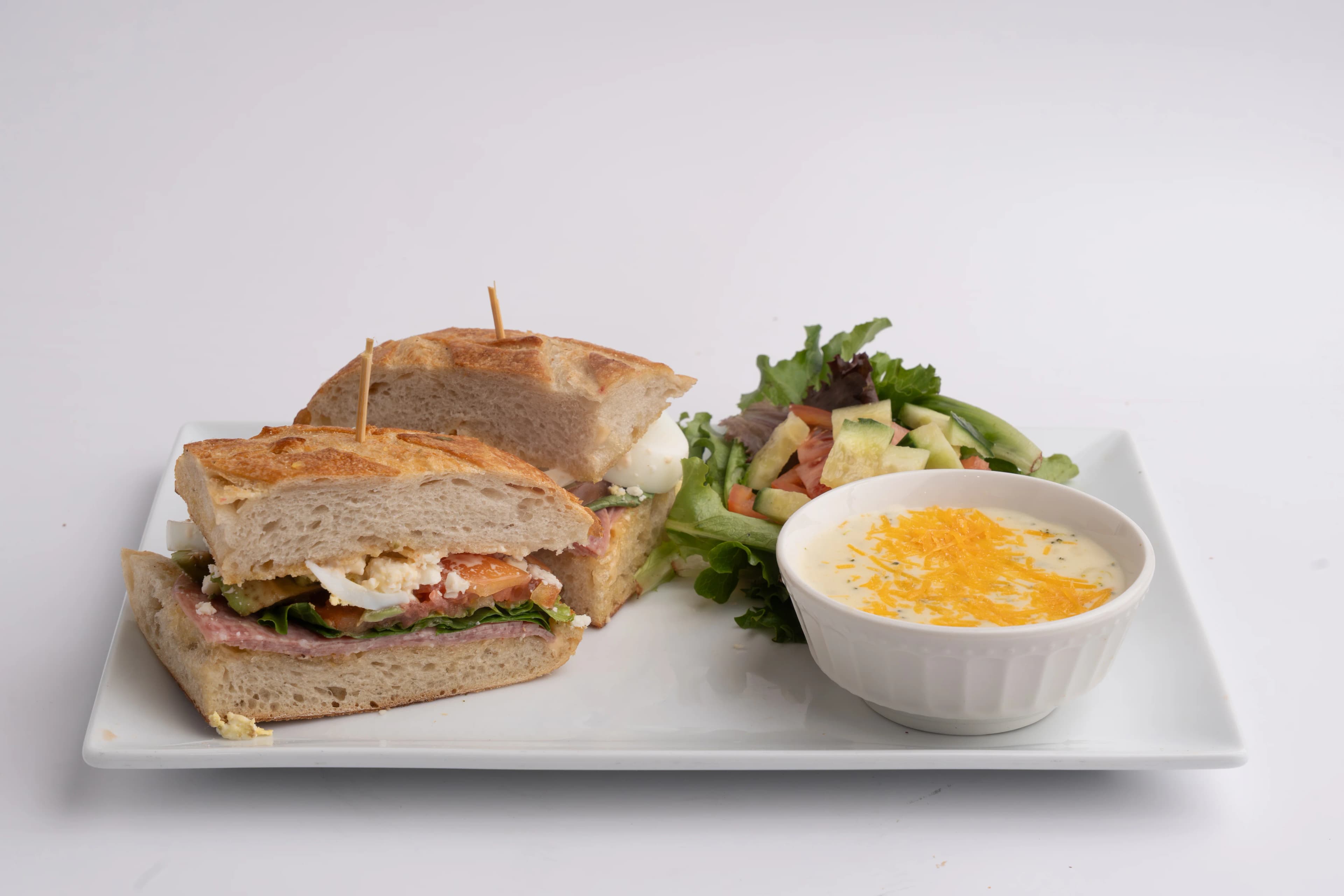 Lunch Combo: 1/2 Turkey Deli Melt sandwich, House Salad, Soup of The Day